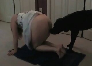 Blonde wife lets her black dog insert its cock deep in her cunt
