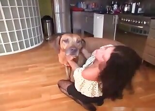Pretty MILF trains her dog to sniff at her soaking needy pussy