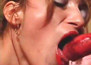 Milf likes her dog’s cock and prefers to have it in her mouth